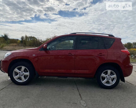 Красный Тойота РАВ 4, объемом двигателя 2 л и пробегом 244 тыс. км за 9500 $, фото 4 на Automoto.ua