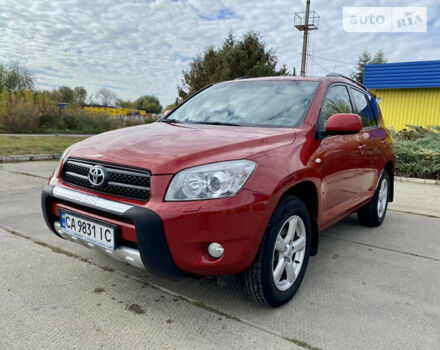 Красный Тойота РАВ 4, объемом двигателя 2 л и пробегом 244 тыс. км за 9500 $, фото 1 на Automoto.ua