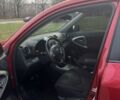 Червоний Тойота РАВ 4, об'ємом двигуна 2 л та пробігом 168 тис. км за 9990 $, фото 5 на Automoto.ua