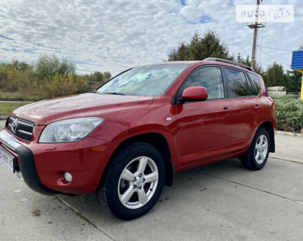 Красный Тойота РАВ 4, объемом двигателя 2 л и пробегом 244 тыс. км за 9500 $, фото 2 на Automoto.ua