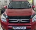 Красный Тойота РАВ 4, объемом двигателя 2 л и пробегом 250 тыс. км за 9500 $, фото 1 на Automoto.ua