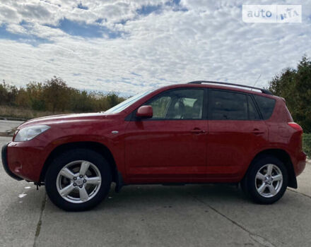 Красный Тойота РАВ 4, объемом двигателя 2 л и пробегом 244 тыс. км за 9500 $, фото 3 на Automoto.ua