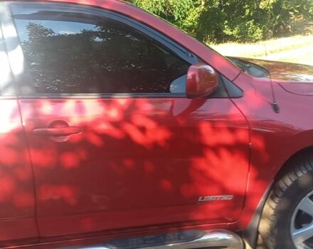 Красный Тойота РАВ 4, объемом двигателя 2.4 л и пробегом 194 тыс. км за 11000 $, фото 5 на Automoto.ua