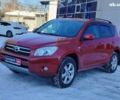 Красный Тойота РАВ 4, объемом двигателя 2 л и пробегом 134 тыс. км за 10690 $, фото 1 на Automoto.ua