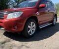 Красный Тойота РАВ 4, объемом двигателя 2 л и пробегом 229 тыс. км за 11200 $, фото 1 на Automoto.ua
