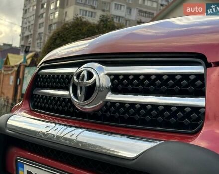 Красный Тойота РАВ 4, объемом двигателя 2.36 л и пробегом 200 тыс. км за 9999 $, фото 5 на Automoto.ua