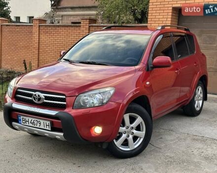 Красный Тойота РАВ 4, объемом двигателя 2.36 л и пробегом 200 тыс. км за 9999 $, фото 1 на Automoto.ua