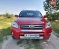 Красный Тойота РАВ 4, объемом двигателя 2 л и пробегом 224 тыс. км за 9800 $, фото 1 на Automoto.ua