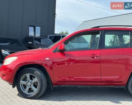 Червоний Тойота РАВ 4, об'ємом двигуна 2 л та пробігом 278 тис. км за 8990 $, фото 3 на Automoto.ua