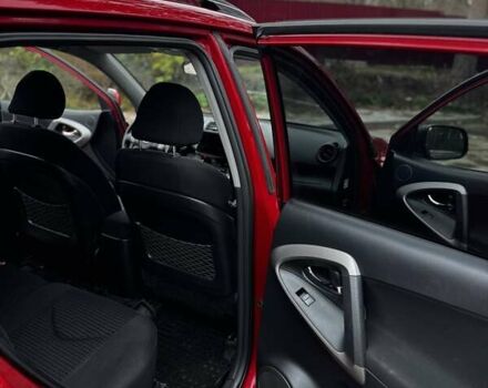 Червоний Тойота РАВ 4, об'ємом двигуна 2 л та пробігом 131 тис. км за 12999 $, фото 9 на Automoto.ua