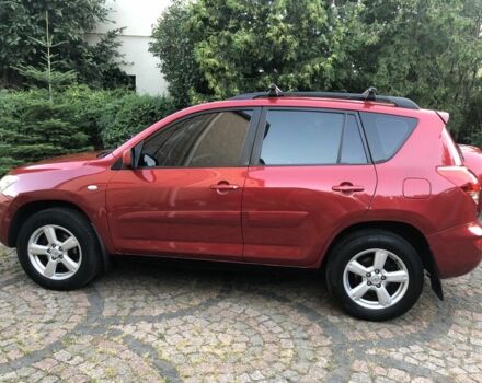 Красный Тойота РАВ 4, объемом двигателя 2 л и пробегом 232 тыс. км за 8999 $, фото 4 на Automoto.ua