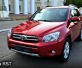 Красный Тойота РАВ 4, объемом двигателя 2 л и пробегом 163 тыс. км за 8300 $, фото 1 на Automoto.ua