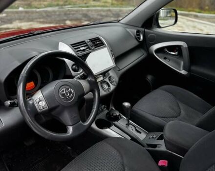 Червоний Тойота РАВ 4, об'ємом двигуна 2 л та пробігом 131 тис. км за 12999 $, фото 3 на Automoto.ua