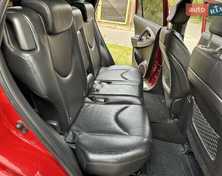 Красный Тойота РАВ 4, объемом двигателя 2.36 л и пробегом 200 тыс. км за 9999 $, фото 96 на Automoto.ua