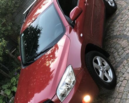 Красный Тойота РАВ 4, объемом двигателя 2 л и пробегом 232 тыс. км за 8999 $, фото 2 на Automoto.ua