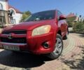 Красный Тойота РАВ 4, объемом двигателя 2.4 л и пробегом 200 тыс. км за 8300 $, фото 1 на Automoto.ua