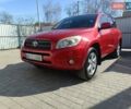 Красный Тойота РАВ 4, объемом двигателя 2.4 л и пробегом 93 тыс. км за 12000 $, фото 1 на Automoto.ua