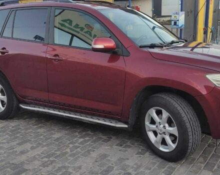 Червоний Тойота РАВ 4, об'ємом двигуна 2 л та пробігом 193 тис. км за 13600 $, фото 4 на Automoto.ua