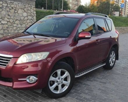 Червоний Тойота РАВ 4, об'ємом двигуна 2 л та пробігом 193 тис. км за 13600 $, фото 1 на Automoto.ua