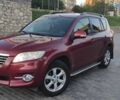 Червоний Тойота РАВ 4, об'ємом двигуна 2 л та пробігом 193 тис. км за 13600 $, фото 1 на Automoto.ua