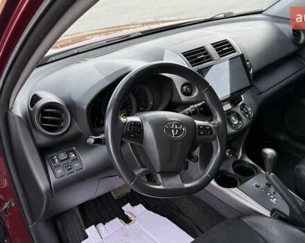 Красный Тойота РАВ 4, объемом двигателя 2 л и пробегом 137 тыс. км за 13699 $, фото 18 на Automoto.ua