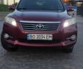 Червоний Тойота РАВ 4, об'ємом двигуна 2 л та пробігом 193 тис. км за 13600 $, фото 1 на Automoto.ua