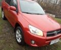 Красный Тойота РАВ 4, объемом двигателя 2.49 л и пробегом 160 тыс. км за 13700 $, фото 1 на Automoto.ua