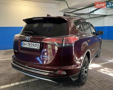 Красный Тойота РАВ 4, объемом двигателя 2.49 л и пробегом 223 тыс. км за 19000 $, фото 2 на Automoto.ua
