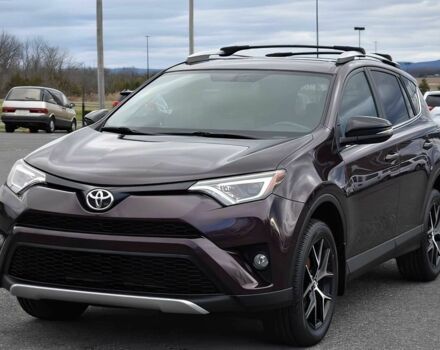 Червоний Тойота РАВ 4, об'ємом двигуна 2.5 л та пробігом 78 тис. км за 7200 $, фото 2 на Automoto.ua