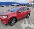 Красный Тойота РАВ 4, объемом двигателя 2.49 л и пробегом 143 тыс. км за 24000 $, фото 1 на Automoto.ua