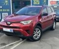 Червоний Тойота РАВ 4, об'ємом двигуна 2.49 л та пробігом 102 тис. км за 19490 $, фото 1 на Automoto.ua