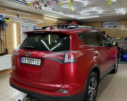 Червоний Тойота РАВ 4, об'ємом двигуна 2.49 л та пробігом 90 тис. км за 18500 $, фото 2 на Automoto.ua