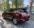 Червоний Тойота РАВ 4, об'ємом двигуна 2.49 л та пробігом 220 тис. км за 22999 $, фото 3 на Automoto.ua