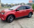 Червоний Тойота РАВ 4, об'ємом двигуна 2.49 л та пробігом 95 тис. км за 15800 $, фото 1 на Automoto.ua