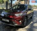 Червоний Тойота РАВ 4, об'ємом двигуна 2.49 л та пробігом 220 тис. км за 22999 $, фото 1 на Automoto.ua