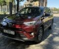 Красный Тойота РАВ 4, объемом двигателя 2.5 л и пробегом 221 тыс. км за 22999 $, фото 1 на Automoto.ua