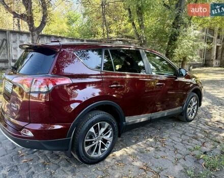 Червоний Тойота РАВ 4, об'ємом двигуна 2.49 л та пробігом 220 тис. км за 22999 $, фото 5 на Automoto.ua