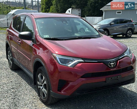 Червоний Тойота РАВ 4, об'ємом двигуна 2.49 л та пробігом 225 тис. км за 9600 $, фото 1 на Automoto.ua