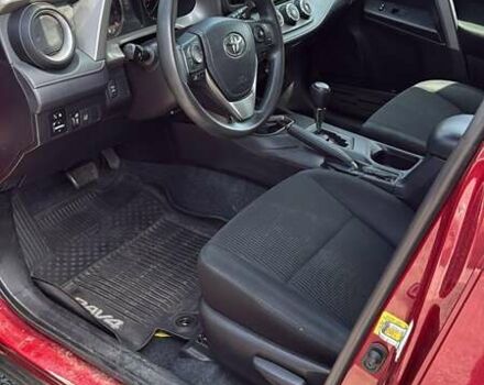 Червоний Тойота РАВ 4, об'ємом двигуна 2.49 л та пробігом 225 тис. км за 9600 $, фото 3 на Automoto.ua