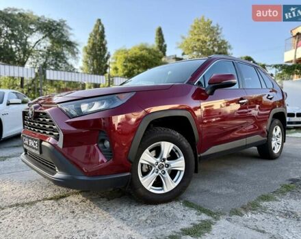 Червоний Тойота РАВ 4, об'ємом двигуна 2.49 л та пробігом 130 тис. км за 21799 $, фото 1 на Automoto.ua