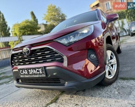 Червоний Тойота РАВ 4, об'ємом двигуна 2.49 л та пробігом 130 тис. км за 21799 $, фото 2 на Automoto.ua