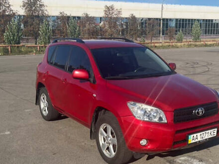 Червоний Тойота РАВ 4, об'ємом двигуна 2 л та пробігом 264 тис. км за 9500 $, фото 1 на Automoto.ua