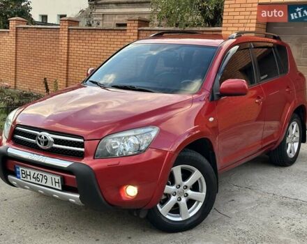 Красный Тойота РАВ 4, объемом двигателя 2.36 л и пробегом 200 тыс. км за 9999 $, фото 1 на Automoto.ua