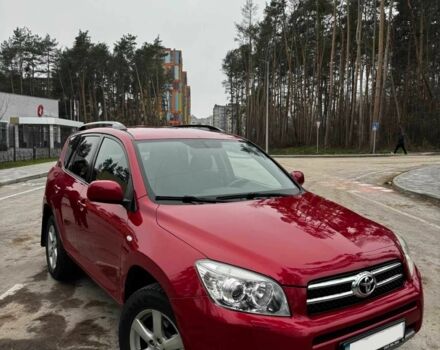 Червоний Тойота РАВ 4, об'ємом двигуна 2 л та пробігом 131 тис. км за 12999 $, фото 1 на Automoto.ua