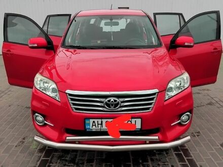 Красный Тойота РАВ 4, объемом двигателя 2 л и пробегом 225 тыс. км за 14000 $, фото 1 на Automoto.ua