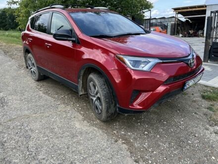 Червоний Тойота РАВ 4, об'ємом двигуна 2.5 л та пробігом 83 тис. км за 17000 $, фото 1 на Automoto.ua
