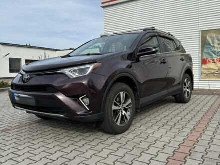 Червоний Тойота РАВ 4, об'ємом двигуна 2.49 л та пробігом 157 тис. км за 21200 $, фото 1 на Automoto.ua