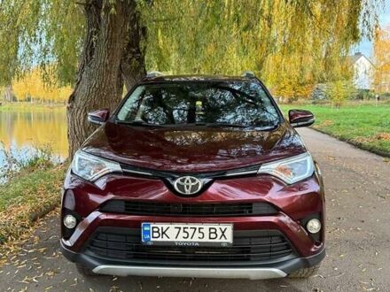 Красный Тойота РАВ 4, объемом двигателя 1.99 л и пробегом 218 тыс. км за 19300 $, фото 1 на Automoto.ua