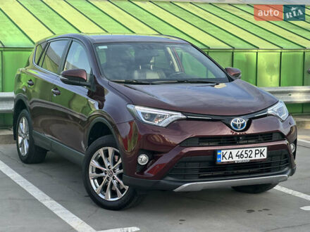 Красный Тойота РАВ 4, объемом двигателя 2.49 л и пробегом 77 тыс. км за 22000 $, фото 1 на Automoto.ua