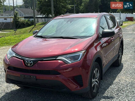 Червоний Тойота РАВ 4, об'ємом двигуна 2.49 л та пробігом 225 тис. км за 9600 $, фото 1 на Automoto.ua